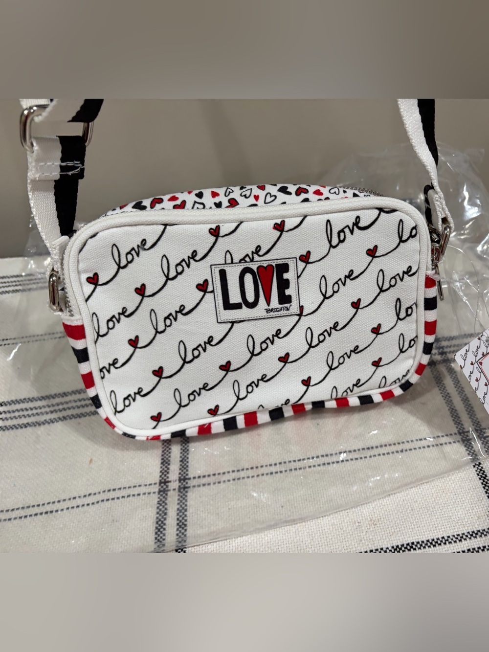 Brighton White Crossbody Bag with Black Script and Red Heart Accents